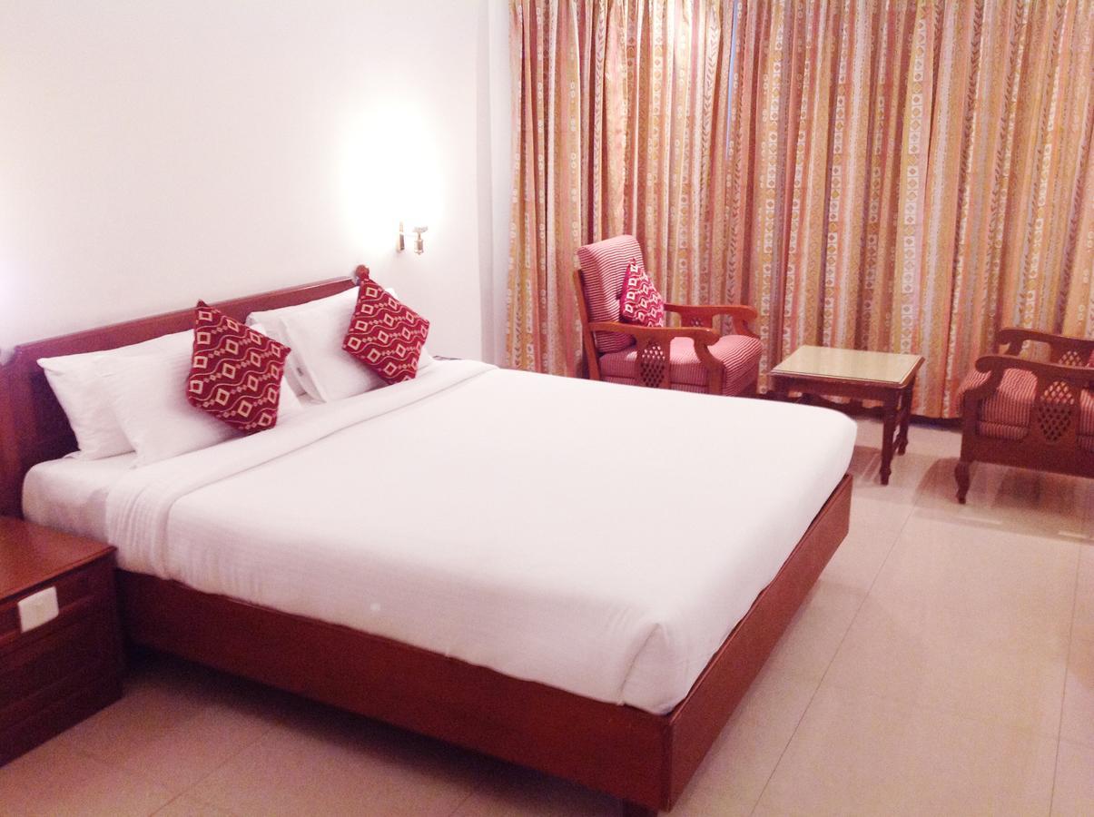 Krishna Inn Guruvayur Bagian luar foto